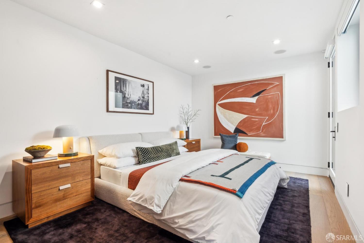 714 Rhode Island Street San Francisco, CA 94107 - Photo 9 of 32 a bed room with a bed and a couch