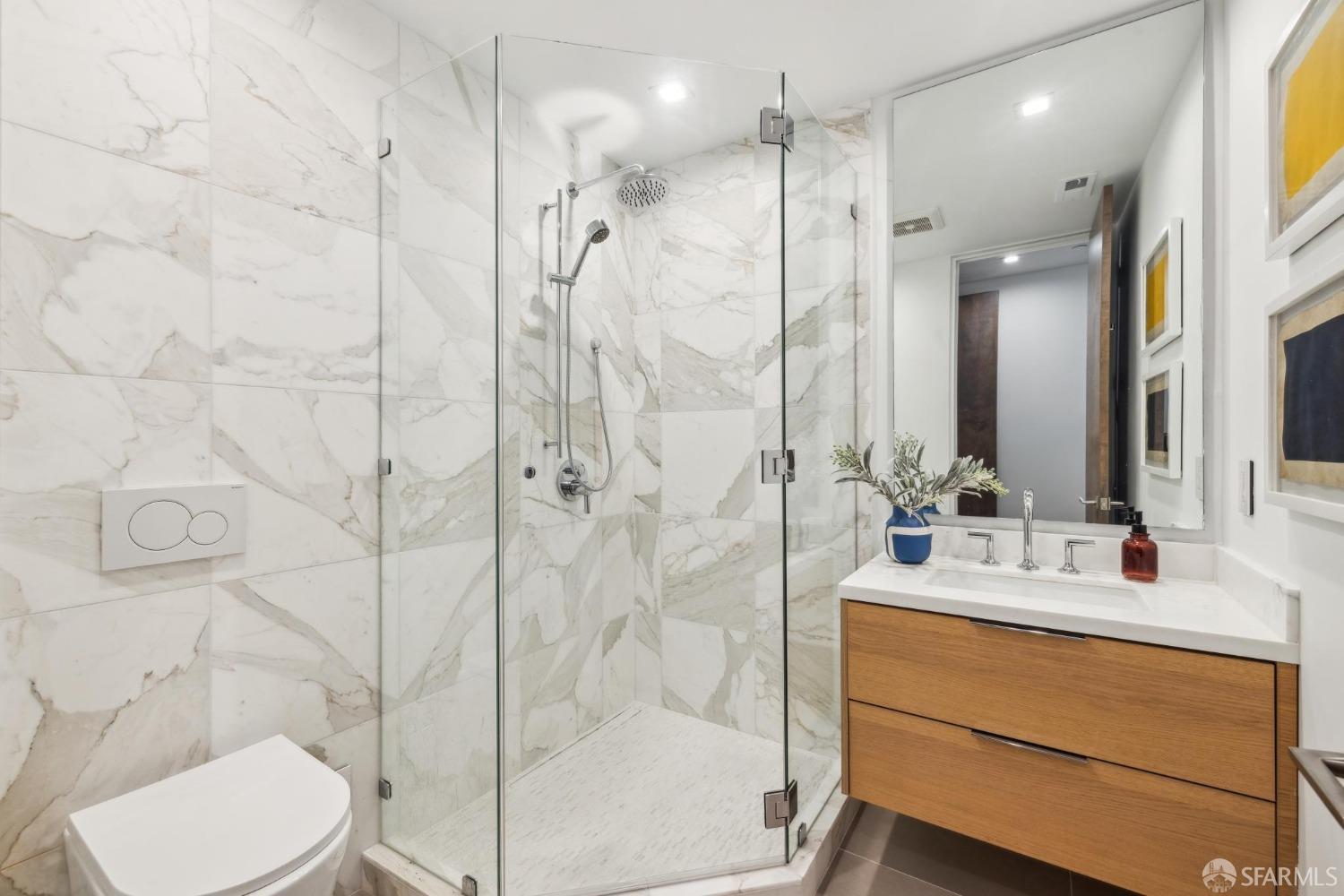 714 Rhode Island Street San Francisco, CA 94107 - Photo 10 of 32 a bathroom with a sink shower and a mirror