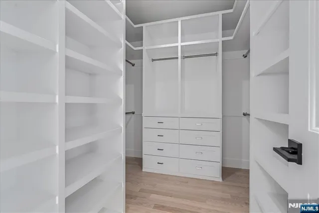 a view of an empty walk in closet