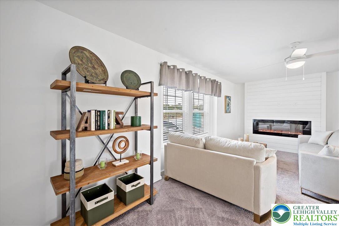 3983 Hastings Road Walnutport, PA 18088 - Photo 12 of 39 a view of living room filled with furniture and a window