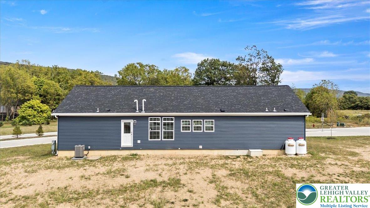 3983 Hastings Road Walnutport, PA 18088 - Photo 2 of 39 a front view of a house with a yard