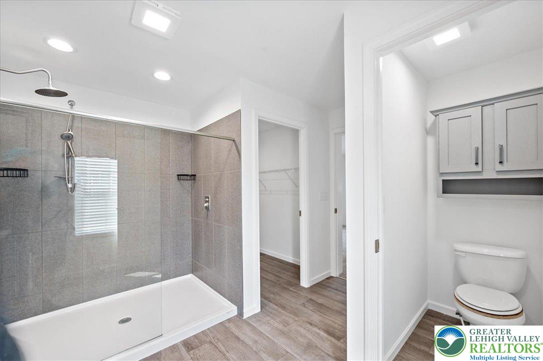 3983 Hastings Road Walnutport, PA 18088 - Photo 25 of 39 a bathroom with a toilet a sink and shower