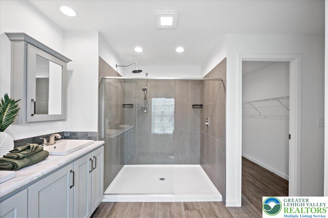 3983 Hastings Road Walnutport, PA 18088 - Photo 26 of 39 a bathroom with a tub sink and mirror