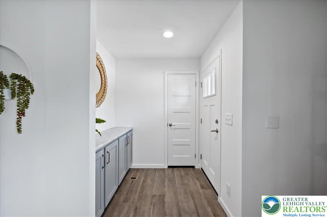 3983 Hastings Road Walnutport, PA 18088 - Photo 10 of 39 a view of hallway with wooden floor