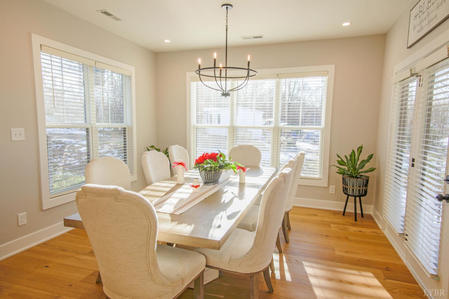 133 Bentley Grv Way Lynchburg, VA 24502 - Photo 15 of 48 a view of a dining room with furniture window and outside view