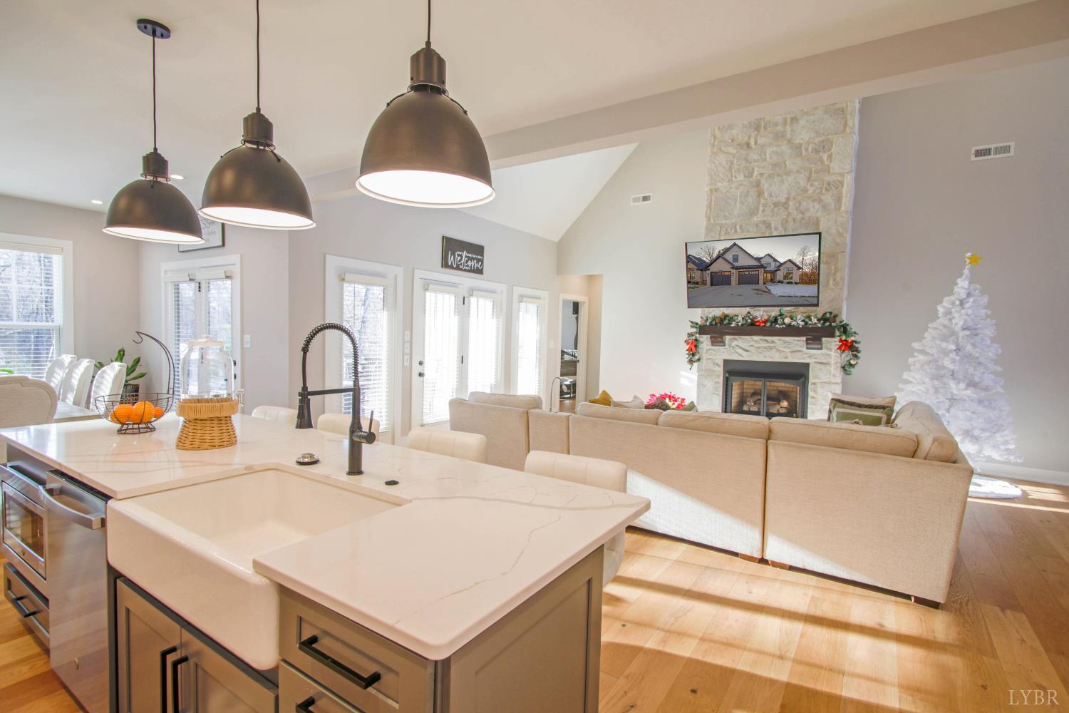 133 Bentley Grv Way Lynchburg, VA 24502 - Photo 22 of 48 a kitchen with a stove a sink and a chandelier