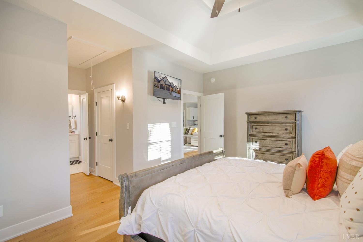 133 Bentley Grv Way Lynchburg, VA 24502 - Photo 27 of 48 a bedroom with a bed and wooden floor