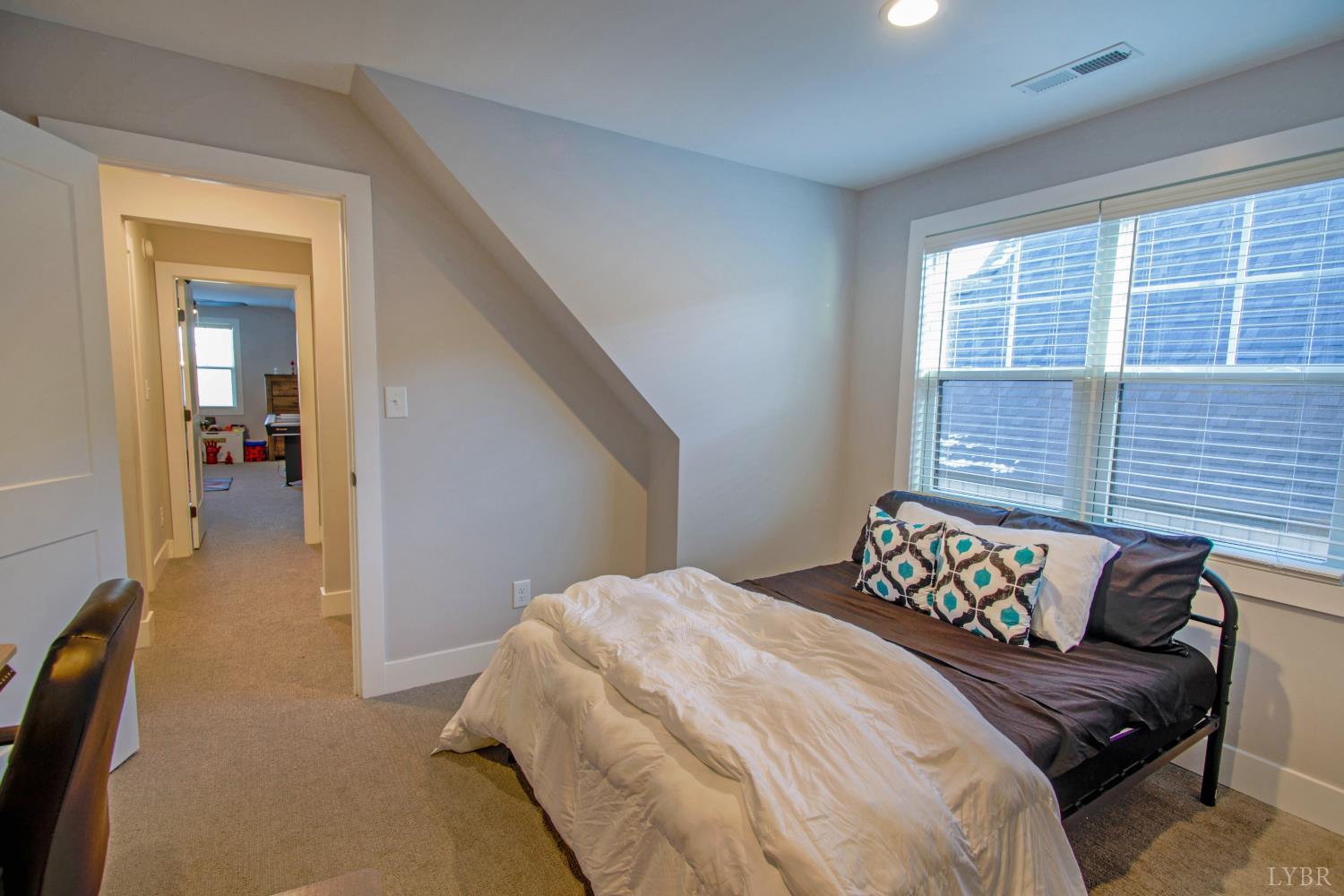133 Bentley Grv Way Lynchburg, VA 24502 - Photo 36 of 48 a bedroom with a bed and a window
