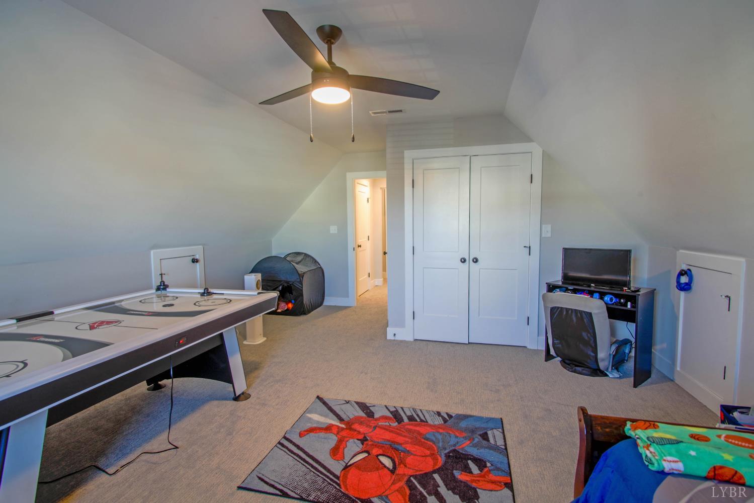 133 Bentley Grv Way Lynchburg, VA 24502 - Photo 41 of 48 a bedroom with furniture and a wooden floor