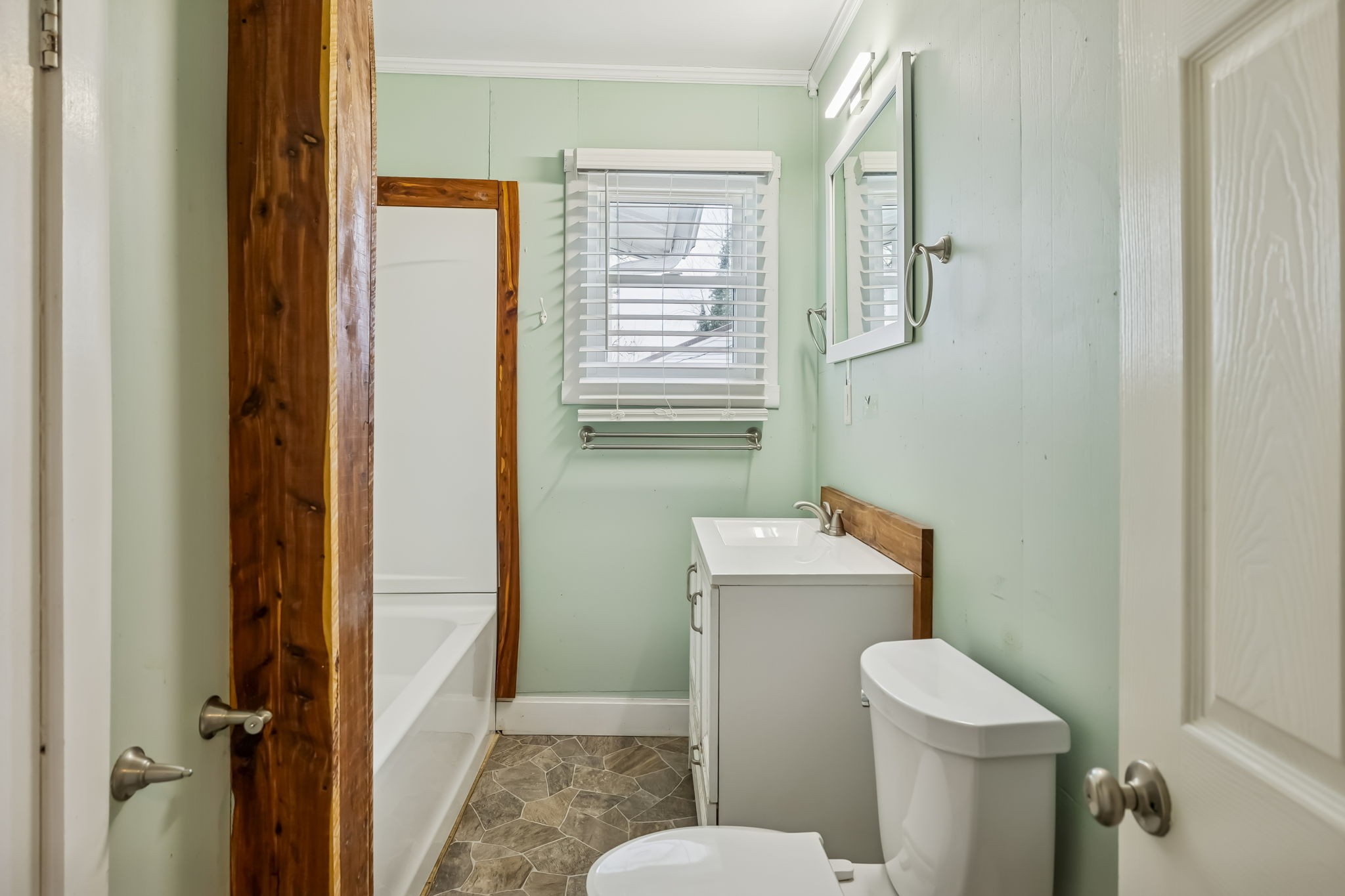 203 Hull Avenue Carthage, TN 37030 - Photo 12 of 27 a bathroom with a toilet sink and mirror
