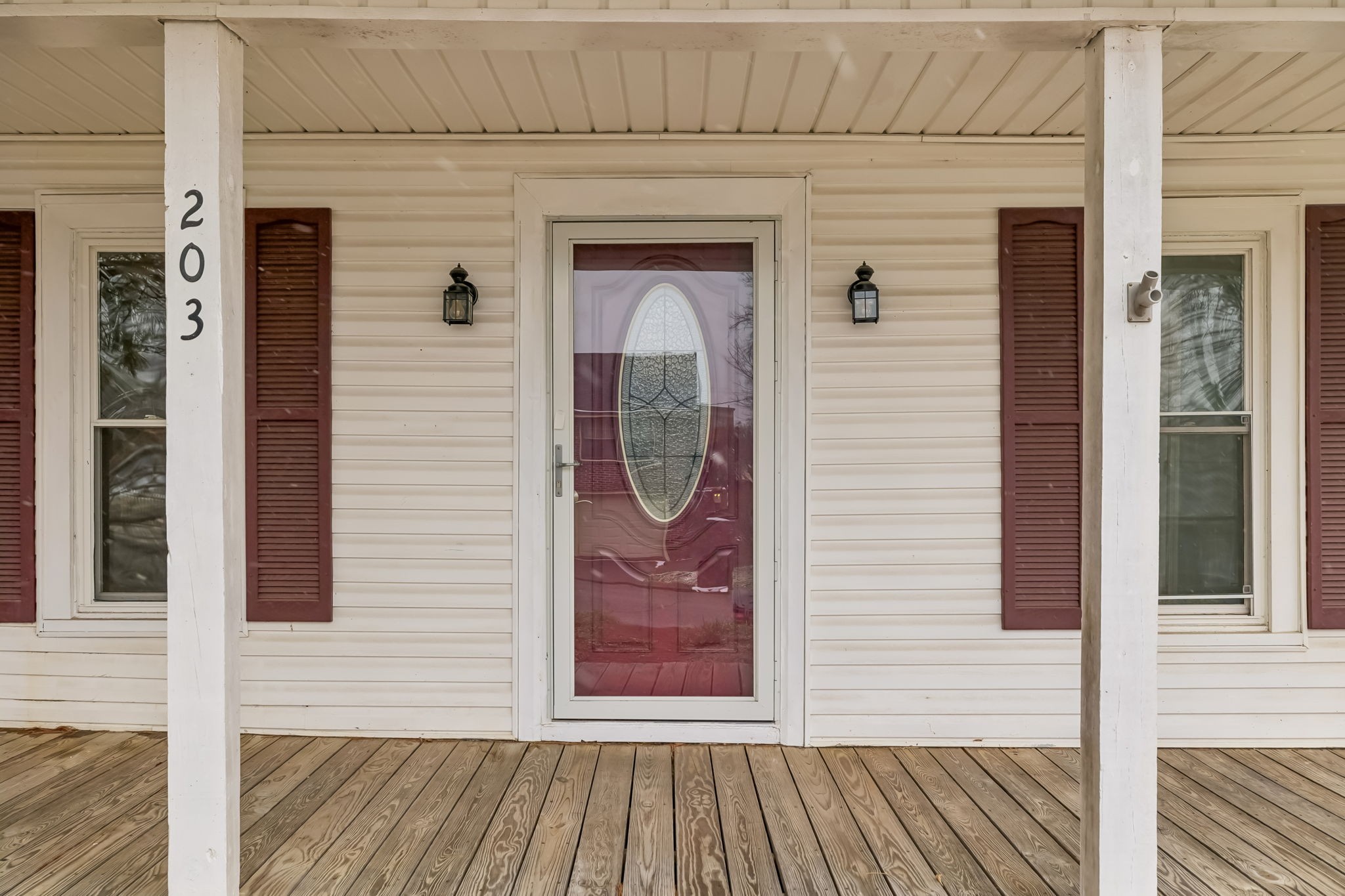 203 Hull Avenue Carthage, TN 37030 - Photo 3 of 27 a front view of a house with a glass door