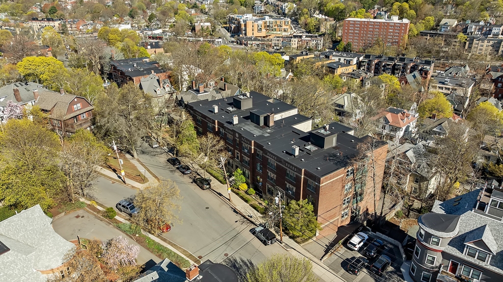 127 Winthrop Road, Unit 6A Brookline, MA 02445 - Photo 6 of 10 an aerial view of a residential apartment building with parking space