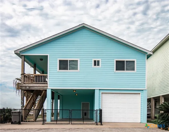 a front view of a house with a balcony