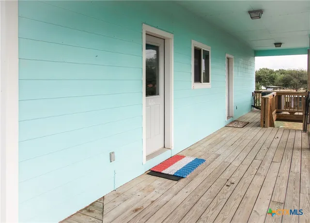 a kitchen with stainless steel appliances a refrigerator sink and microwave