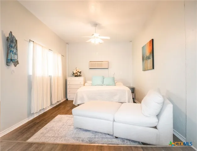 a bathroom with a shower and a bathtub