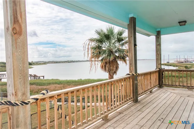 a kitchen with stainless steel appliances granite countertop a stove a sink dishwasher and a refrigerator