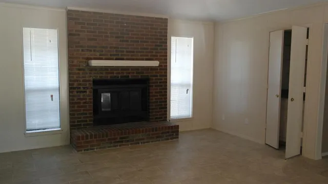 a living room with a fireplace