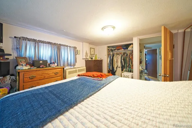 a living room with furniture and window