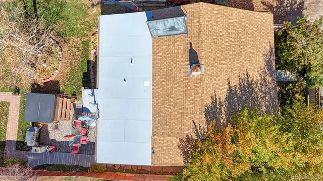 a view of backyard with a patio and wooden fence