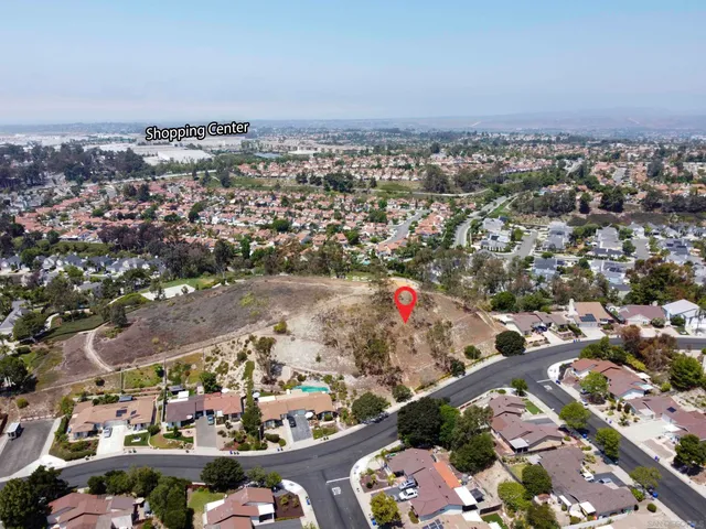 an aerial view of a swimming pool and outdoor space