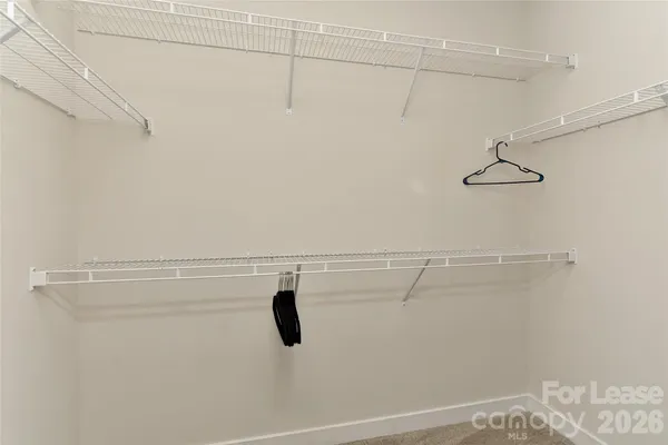 a view of a room with racks on the wall