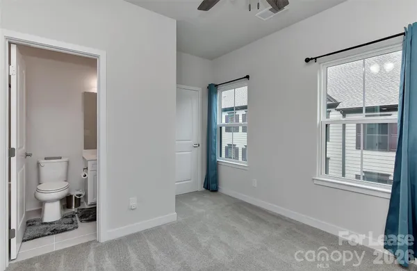 a view of a bathroom with a toilet