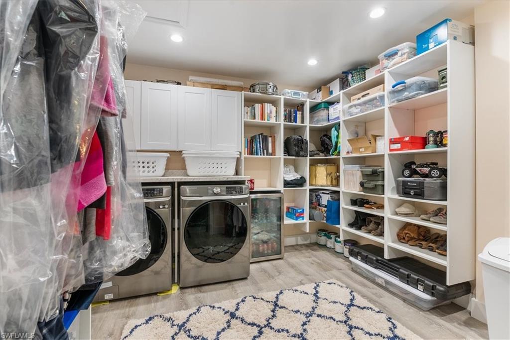 1820 19th Street Southwest Naples, FL 34117 - Photo 12 of 31 a storage room with washer and dryer