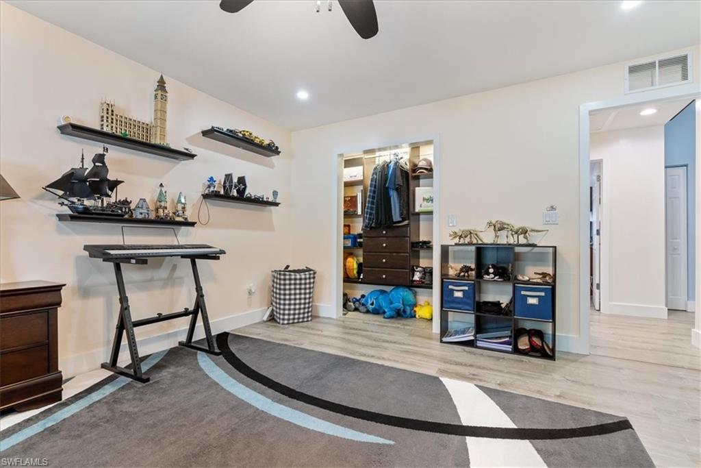 1820 19th Street Southwest Naples, FL 34117 - Photo 16 of 31 a view of a room with gym equipment