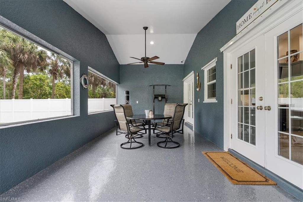 1820 19th Street Southwest Naples, FL 34117 - Photo 20 of 31 a view of a dining room with furniture window and outside view