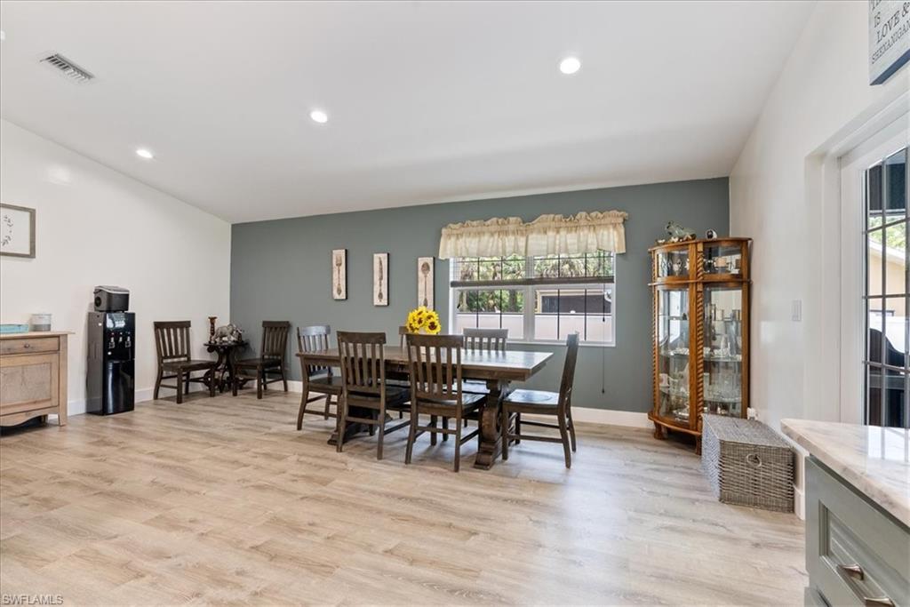 1820 19th Street Southwest Naples, FL 34117 - Photo 9 of 31 a view of a dining room with furniture and window