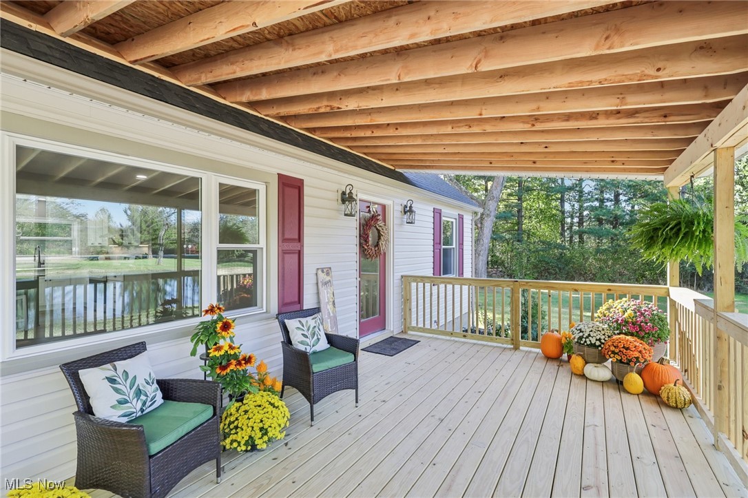 8015 Fairmount Road Novelty, OH 44072 - Photo 11 of 50 Wooden deck featuring a water view