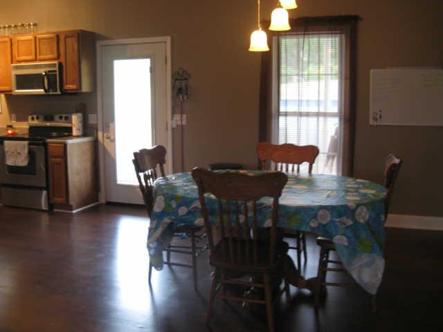 148 Old Huntland Road Elora, TN 37328 - Photo 6 of 18 Just a few steps and the user-friendly kitchen and eat-in area merge allowing serving meals quick and easy.