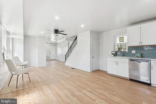 a kitchen with a refrigerator sink and microwave