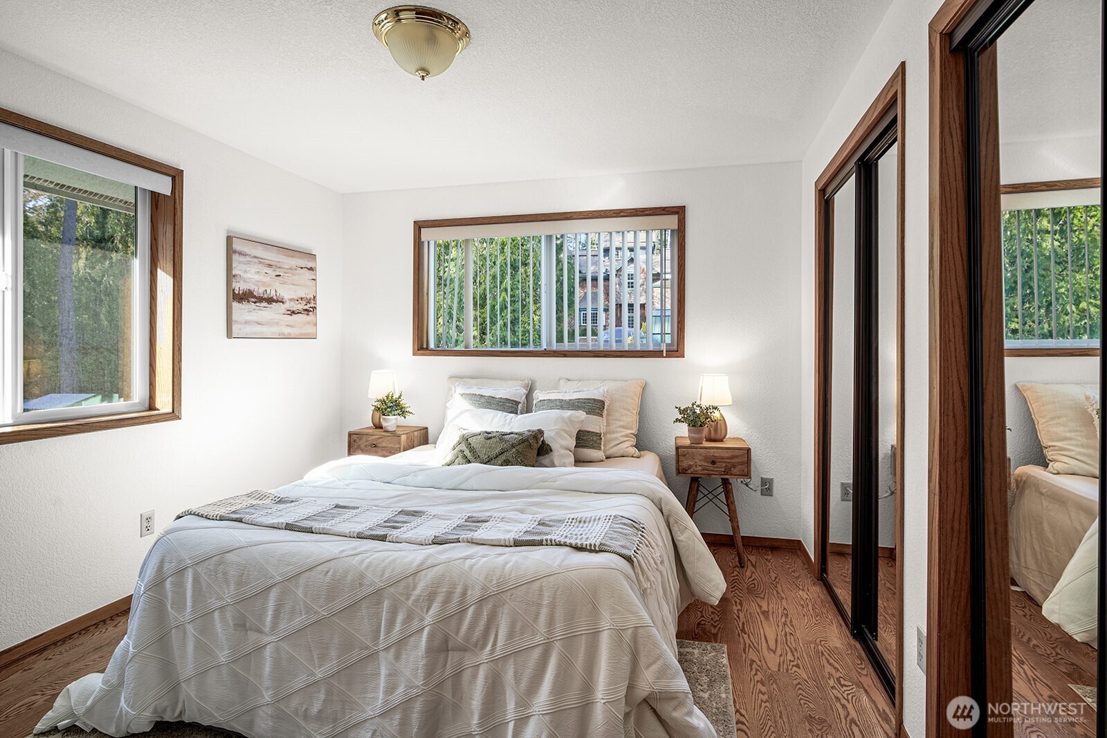 6819 Clf Avenue Southwest Longbranch, WA 98351 - Photo 17 of 29 a bedroom with a bed and a window