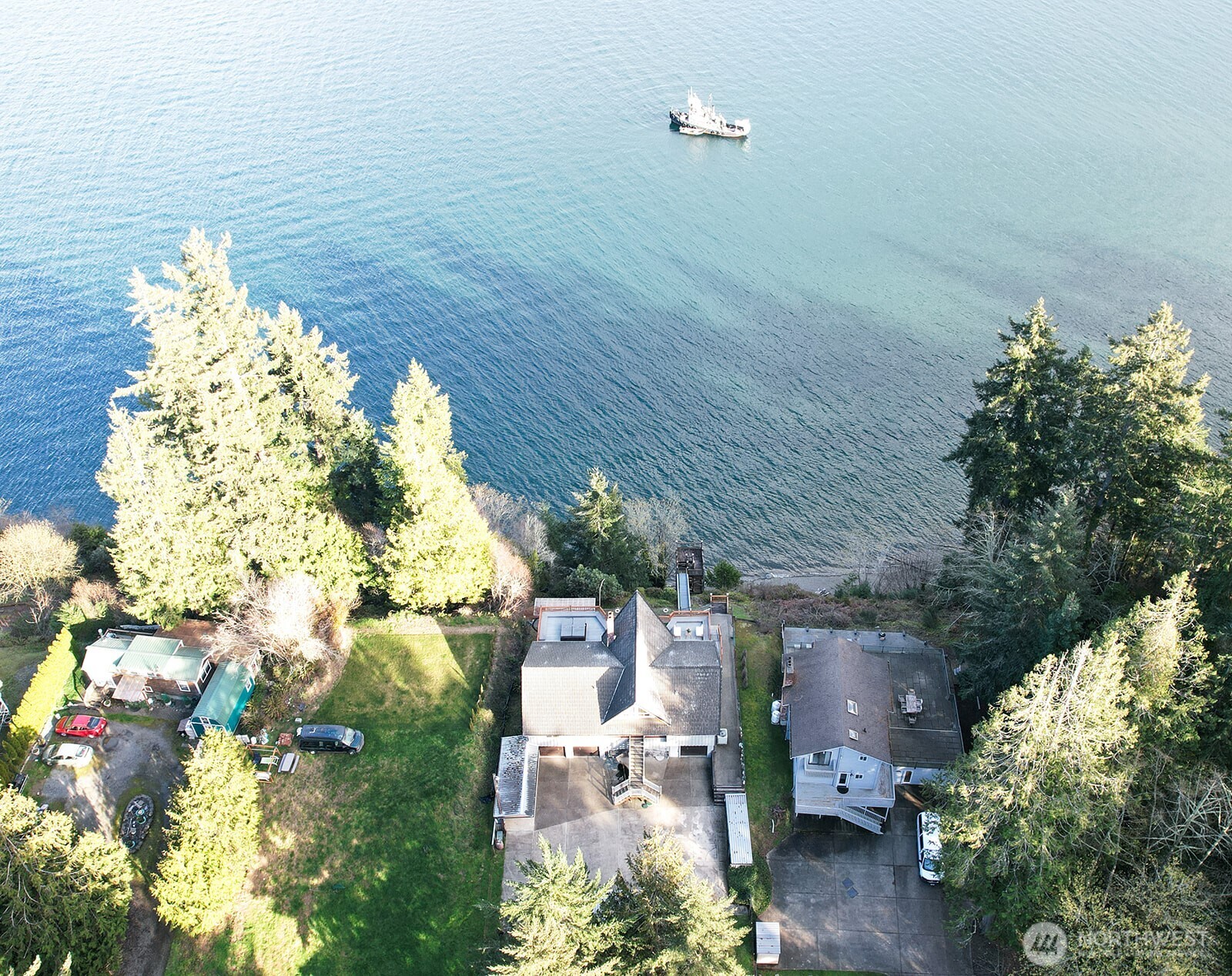 6819 Clf Avenue Southwest Longbranch, WA 98351 - Photo 27 of 29 a picture of houses with outdoor space