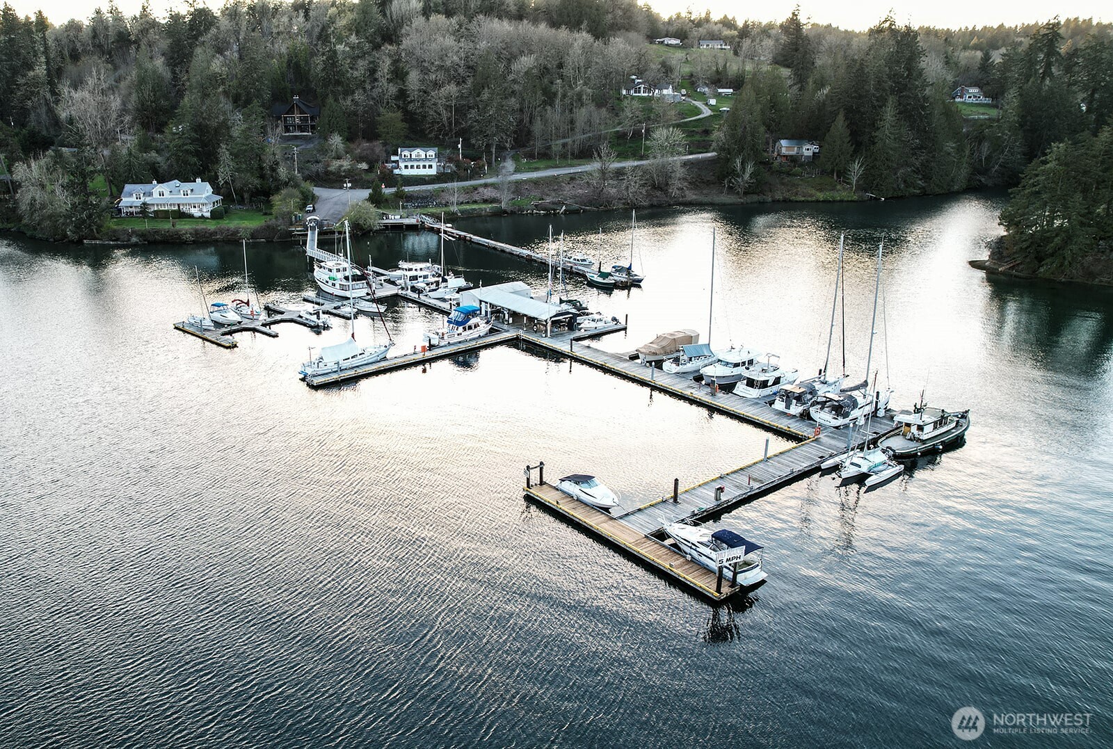 6819 Clf Avenue Southwest Longbranch, WA 98351 - Photo 29 of 29 a backyard of a house with table and chairs