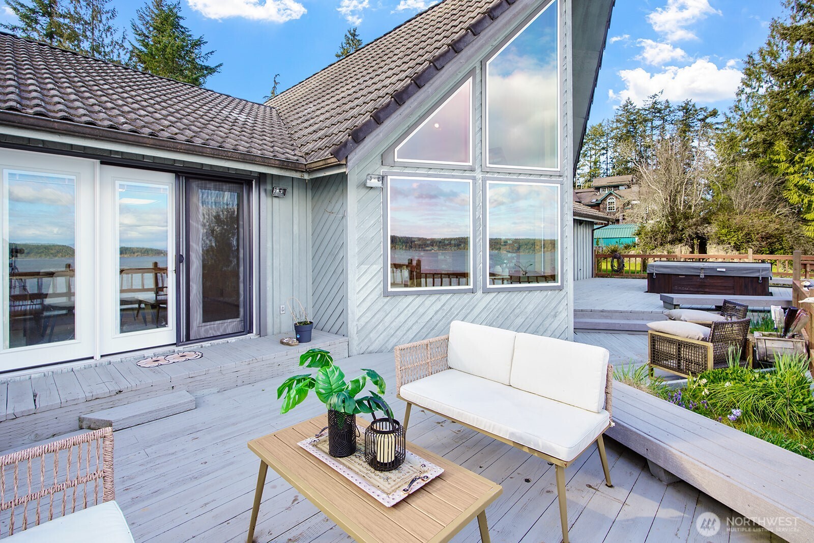6819 Clf Avenue Southwest Longbranch, WA 98351 - Photo 4 of 29 a view of a patio with couches and potted plants