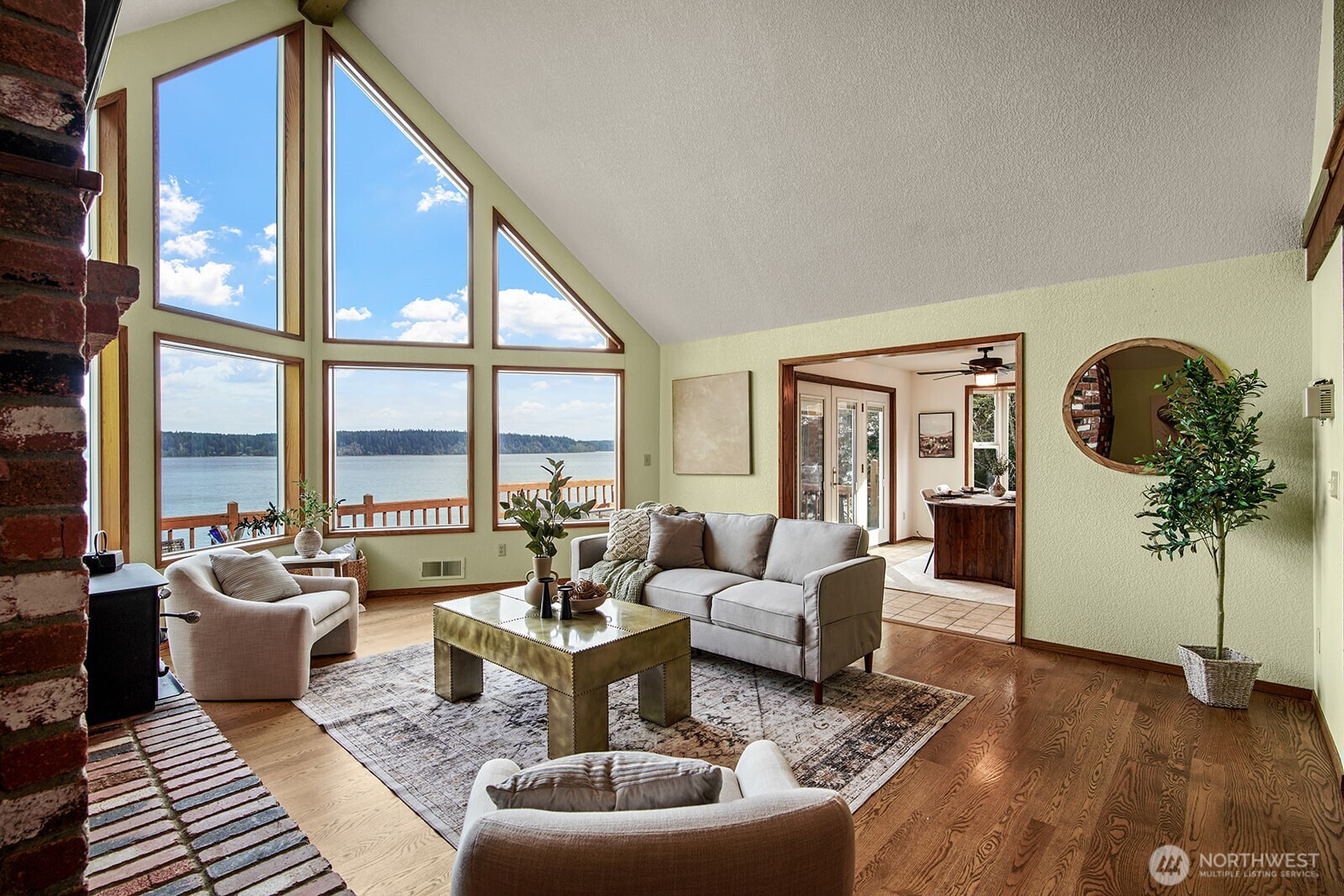 6819 Clf Avenue Southwest Longbranch, WA 98351 - Photo 8 of 29 a living room with furniture and a large window