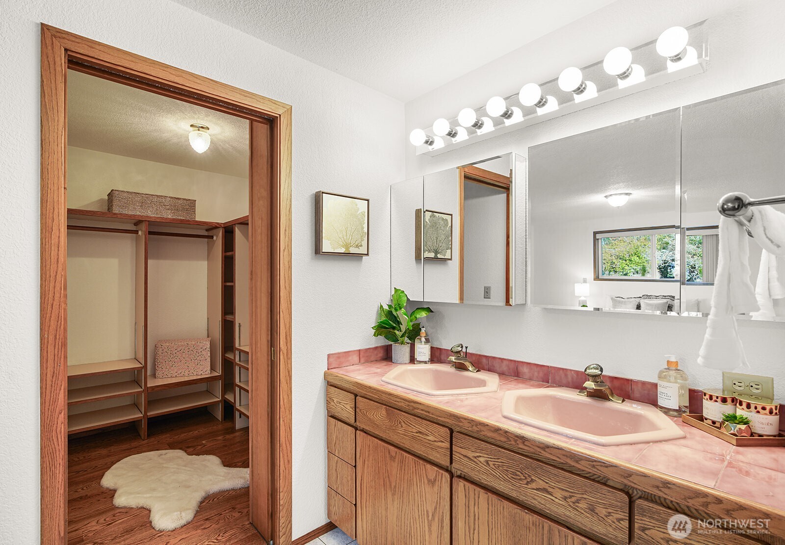 6819 Clf Avenue Southwest Longbranch, WA 98351 - Photo 10 of 29 a bathroom with a sink a vanity and a mirror
