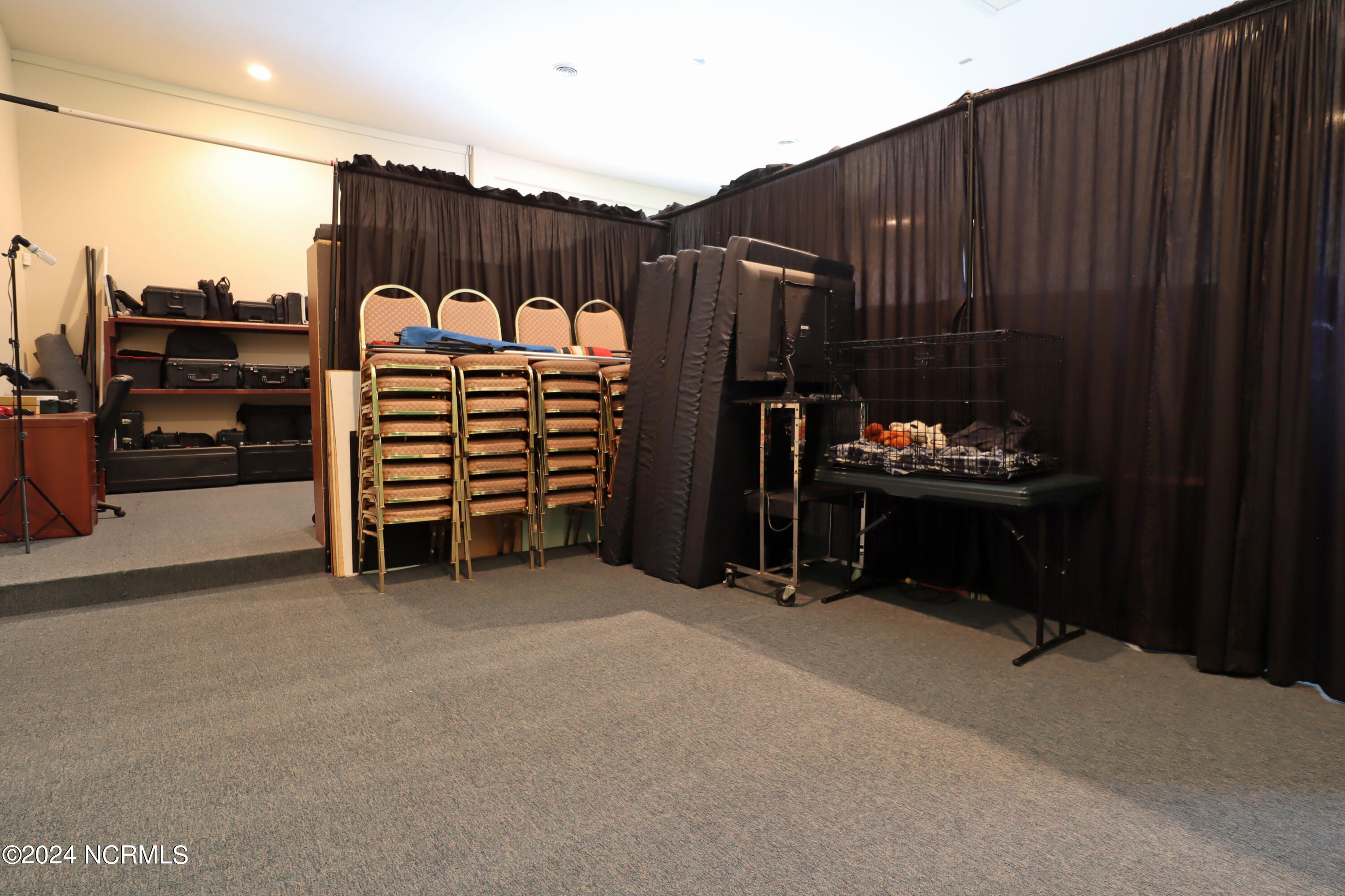 135 P229 Vass, NC 28394 - Photo 22 of 52 Meeting Room behind curtains - stage
