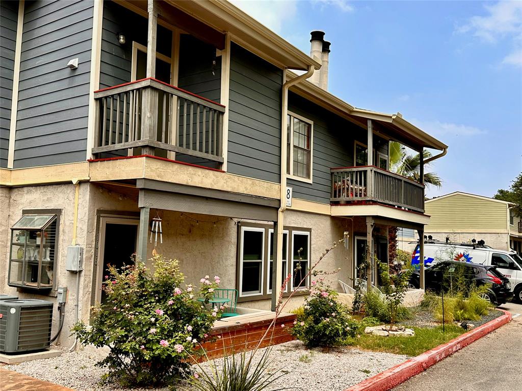 2215 Post Road, Unit 1010 Austin, TX 78704 - Photo 20 of 25 front view of a house with a porch