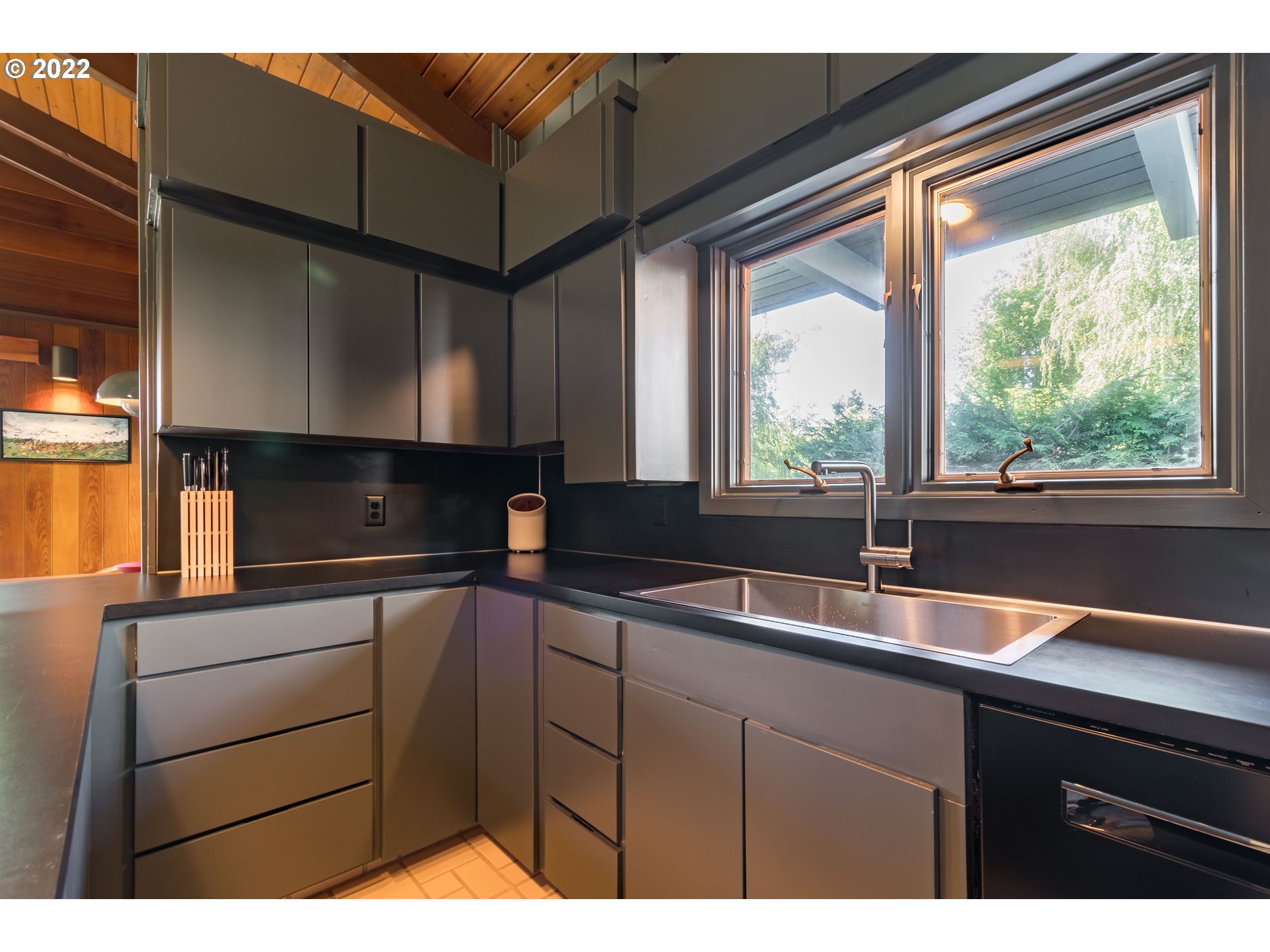 2000 University Street Eugene, OR 97403 - Photo 11 of 32 a kitchen with a sink and large window