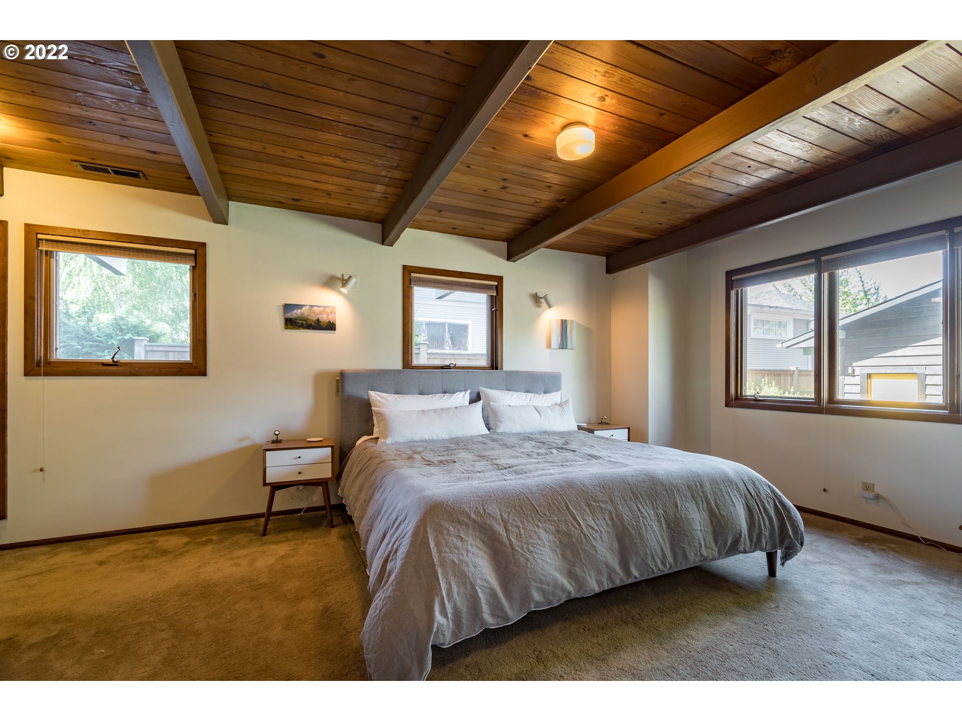 2000 University Street Eugene, OR 97403 - Photo 17 of 32 a bedroom with a bed mirror and window