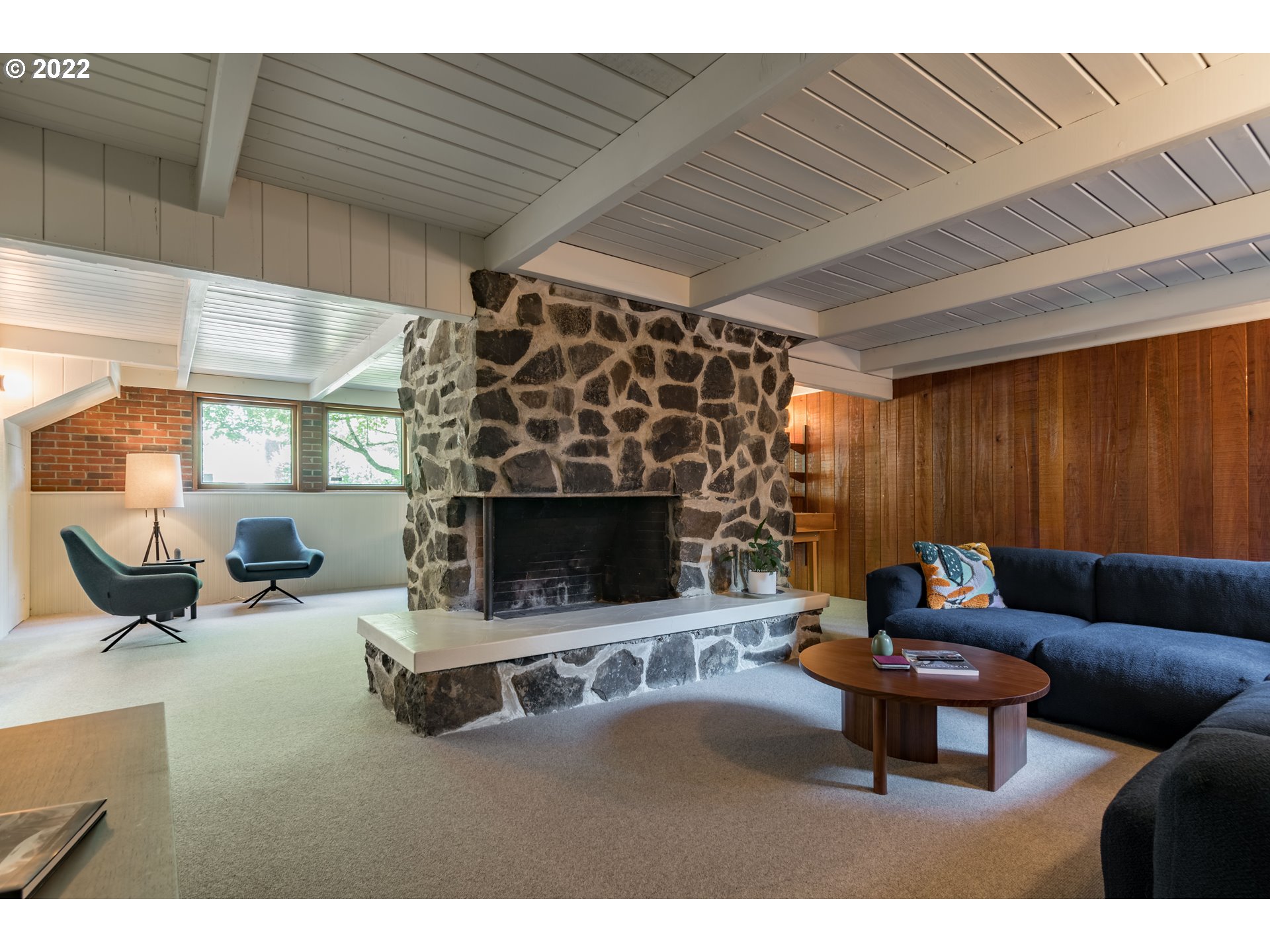 2000 University Street Eugene, OR 97403 - Photo 22 of 32 a living room with furniture and a fireplace