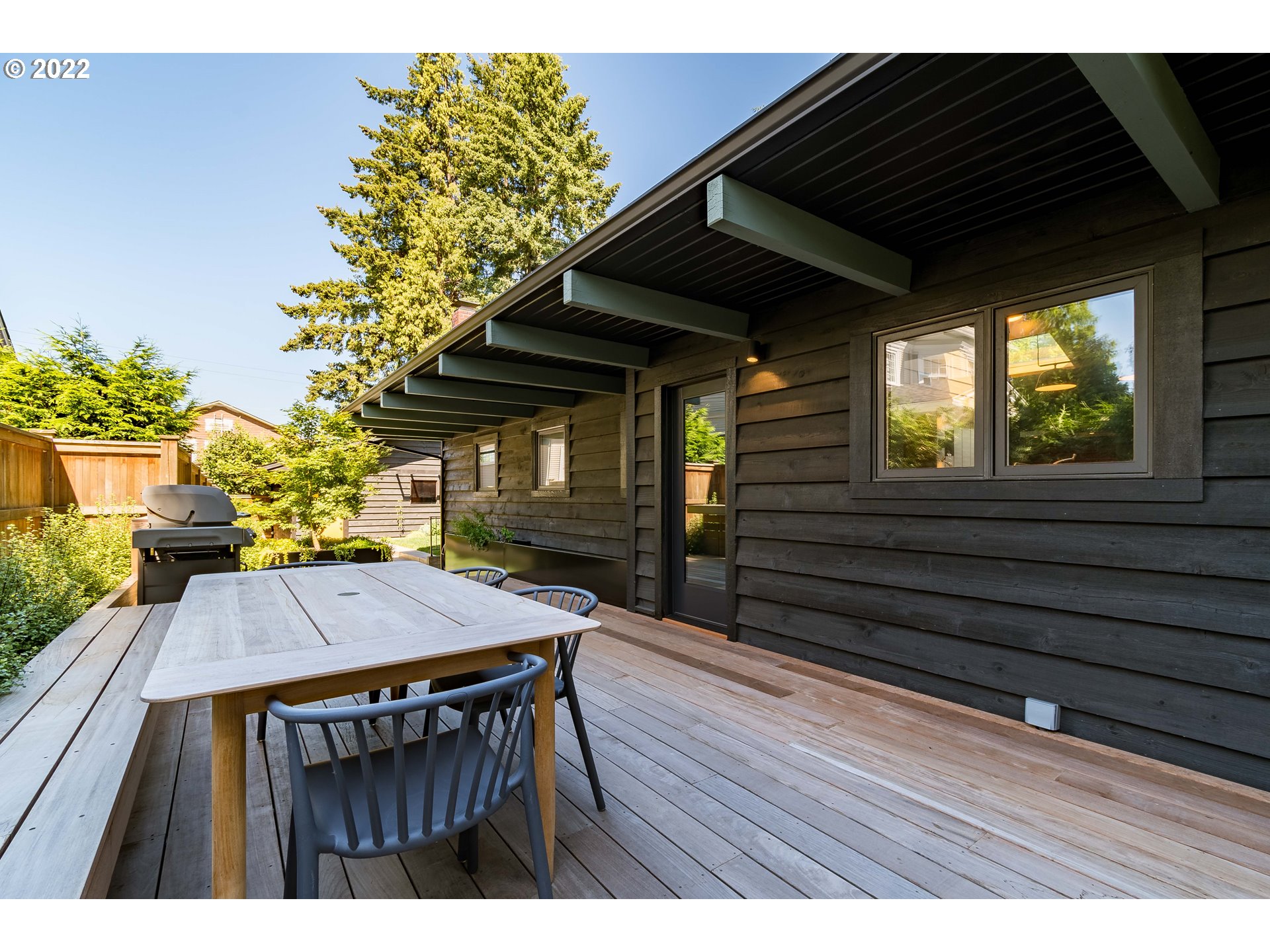 2000 University Street Eugene, OR 97403 - Photo 27 of 32 a view of a wooden deck and a patio