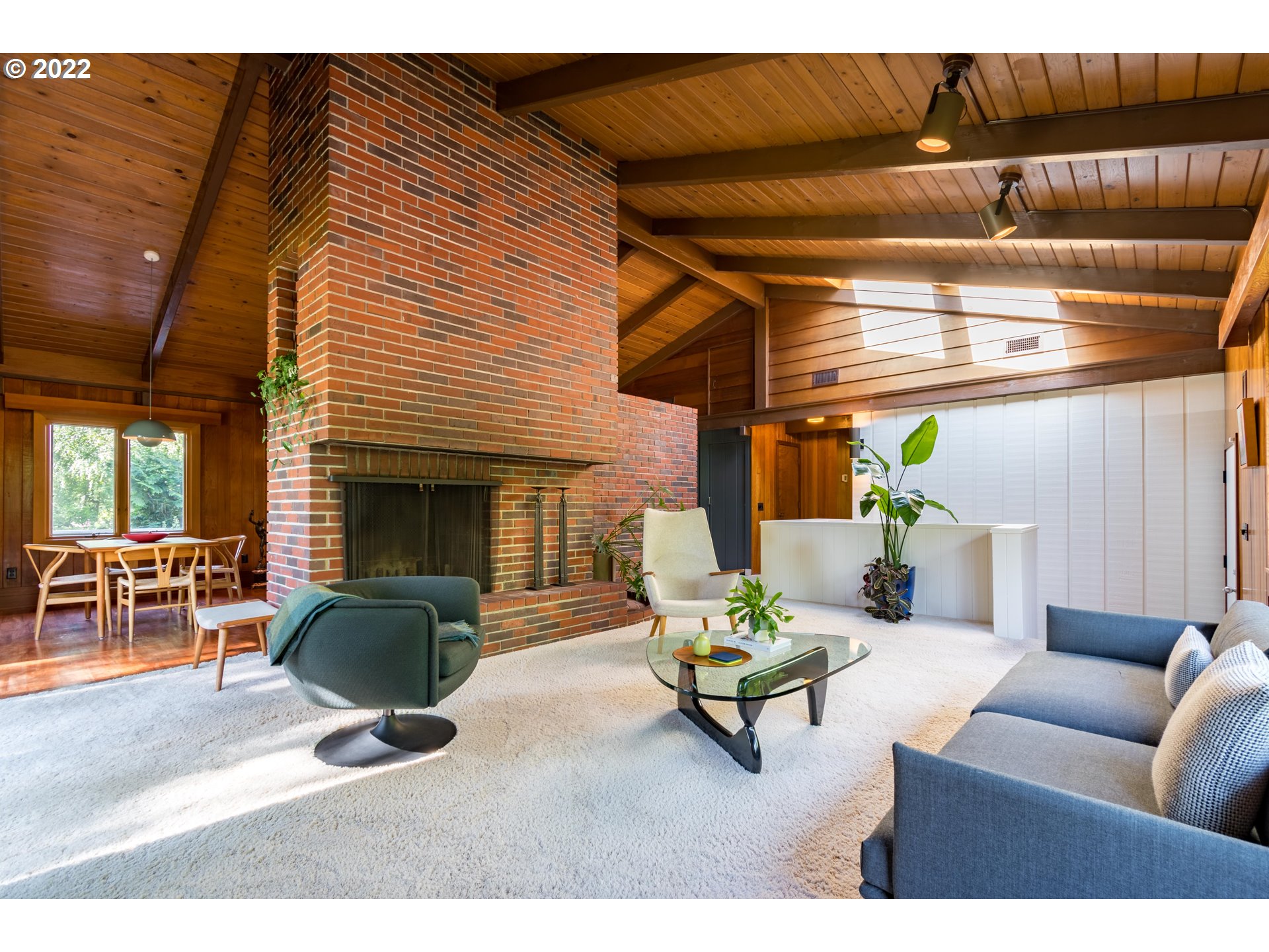 2000 University Street Eugene, OR 97403 - Photo 6 of 32 a living room with furniture and a fireplace