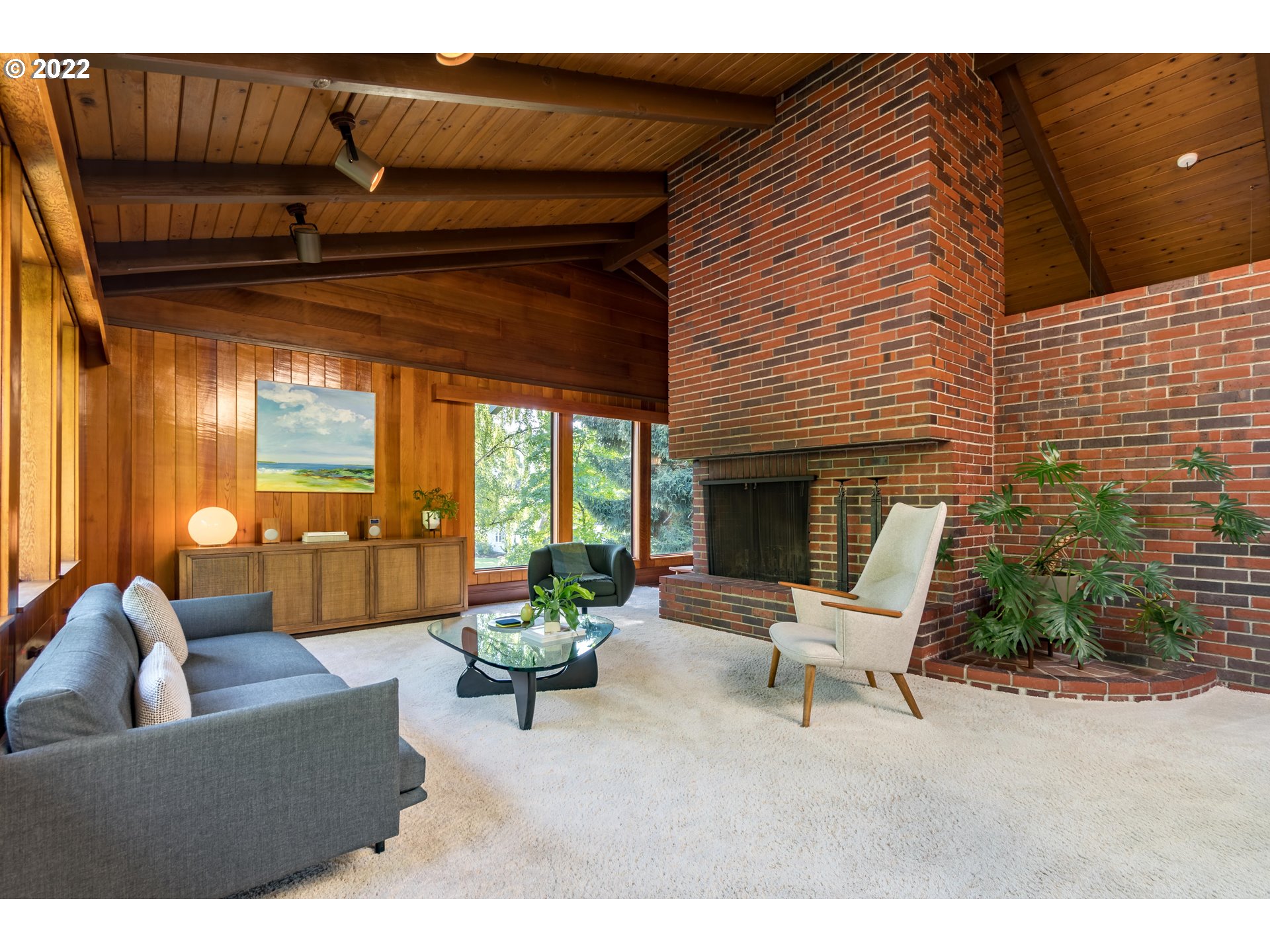2000 University Street Eugene, OR 97403 - Photo 7 of 32 a living room with furniture and a fireplace