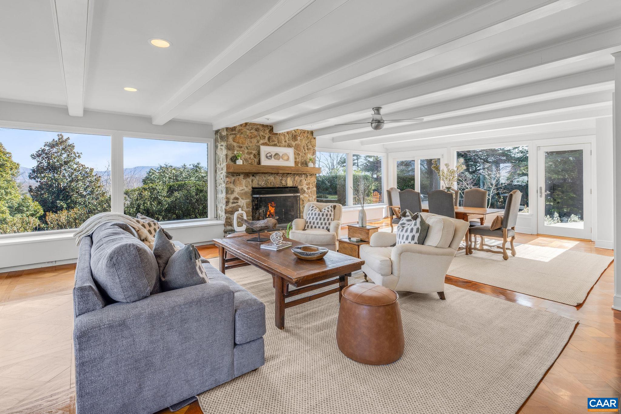 2418 Northfield Road Charlottesville, VA 22901 - Photo 14 of 47 a living room with fireplace furniture and a large window