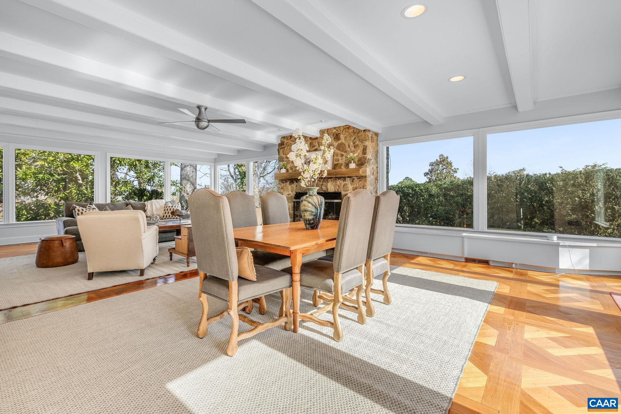 2418 Northfield Road Charlottesville, VA 22901 - Photo 16 of 47 a view of a dining room with furniture window and outside view