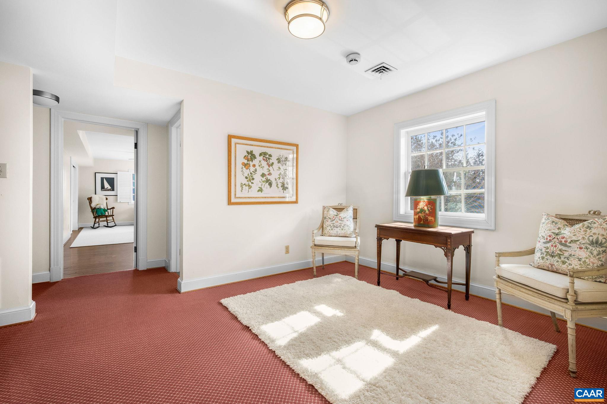 2418 Northfield Road Charlottesville, VA 22901 - Photo 20 of 47 a living room with furniture and next to a window